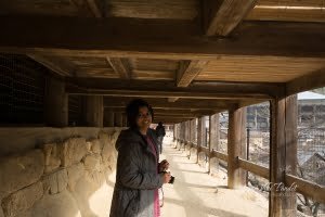 Walking under Senjokaku Hall in Miyajima